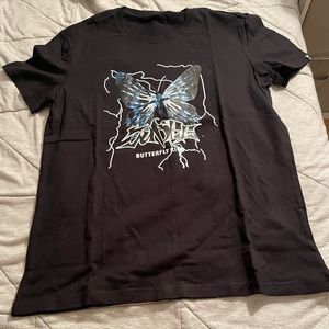 Black shirt with pretty butterfly